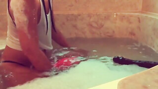Interracial sexual intercourse in bathtub with a woman with remarkable butt