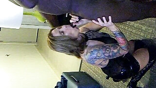 Beautiful tattooed MILF down on her knees making BBC happy with her mouth