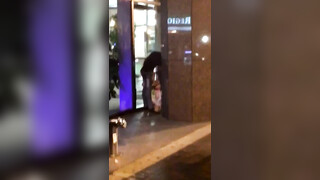 WTF White woman caught in public on her knees sucking dry a black stranger